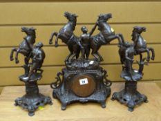 An vintage spelter equestrian clock garniture (clock movement removed) Condition reports provided on