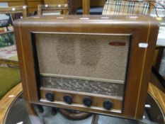 A vintage veneer cased Pye wireless radio Condition reports provided on request by email for this