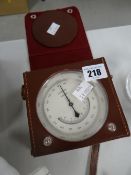 A vintage cased chrome dial gauge Condition reports provided on request by email for this auction