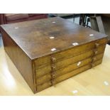 A wooden specimen cabinet chest-of-drawers or small plan-chest Condition reports provided on request