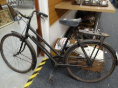 A vintage Raleigh Sports model push bike circa 1950s with original pump Condition reports provided
