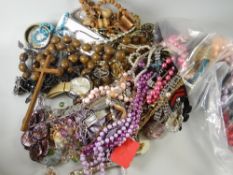 A large quantity of costume jewellery, some cased items but mainly in two large bags Condition