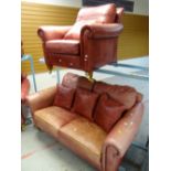 Two red leather Duresta sofas together with a matching leather chair & two footstools Condition rep