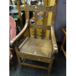 An 1897/1898 oak Eisteddfodic chair, carved with both dates & inscribed 'Bont ar dan' Condition