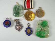 A parcel of silver sporting pendants ETC Condition reports provided on request by email for this