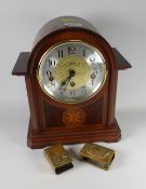 A reproduction German mantel clock & two brass matchbox cases Condition reports provided on