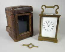 A cased brass carriage clock with rectangular white enamel dial & Roman numerals Condition reports