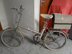 A retro Raleigh shopper bicycle with bag Condition reports provided on request by email for this
