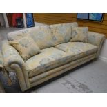 An Alston's Upholstery Ltd two-seater Duck Egg floral patterned sofa Condition reports provided on