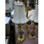 Group of modern brass table lamps