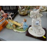 Two Capodimonte figurines of a young boy and girl on a seesaw (slight damage) and a woman in vintage