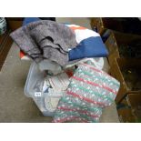 Plastic crate of linen including large British flag