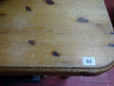 Antique pine style extending dining table on turned supports