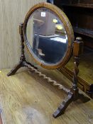 Oak oval toilet mirror on a barley twist frame