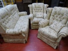 Stylish modern three piece lounge suite, button backed in neutral floral patterned upholstery