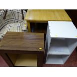 Two melamine storage cubes, a modern light wood dining table and a rosewood effect entertainment