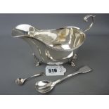 Asprey & Co Ltd silver sauce boat, London 1921, 5.4 troy ozs along with a silver lustre spoon and an