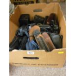 Box of vintage cameras and binoculars