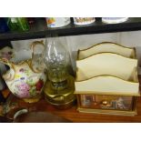 Victorian wash jug, brass paraffin lamp and a modern letter rack with lower drawer