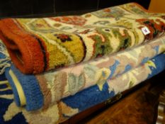 Three small woollen rugs