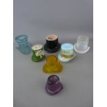 Collection of glass and pottery ornaments in the shape of hats