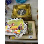 Two framed silkwork pictures, small selection of postcards, gilt picture frame etc