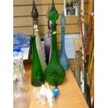 Collection of tall stem bottle vases and stoppers along with four further stoppers