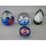 Four Scottish and other colourful glass paperweights