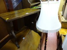 Oak side table and a reproduction mahogany effect standard lamp with shade