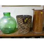 Green glass carboy, wicker basket and a cylindrical copper vessel with carry handle