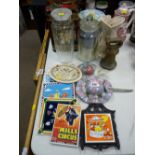 Selection of storage tins and jars, a quantity of decorative modern tiles and hat ornaments etc