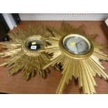 Starburst wall mirror and a similar wall clock