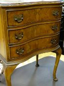 Reproduction walnut serpentine three drawer chest on cabriole supports