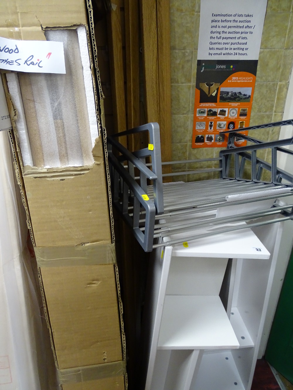 Boxed hardwood clothes rail, two melamine shelf units, two variable cupboard baskets and a