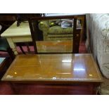 Reproduction gilt tooled leather topped Long John coffee table and a modern mahogany framed wall