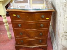 Serpentine front reproduction chest of four drawers