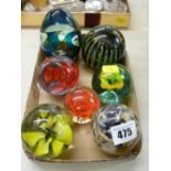 Seven vintage paperweights by Caithness, Mdina and others