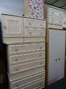 Modern light wood two door wardrobe, two melamine three drawer and two x two drawer chests,