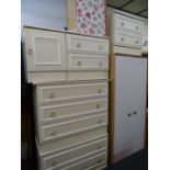 Modern light wood two door wardrobe, two melamine three drawer and two x two drawer chests,