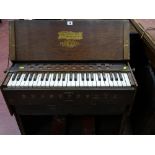 Vintage 'Marshall Brothers Universal Folding Organ', manufactured in the USA, in apparently