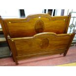 Pair of vintage mahogany bed ends with irons