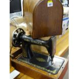 Cased Singer sewing machine