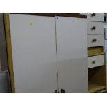 Modern cream and oak effect bedroom suite of two door wardrobe, three drawer bedside chest and