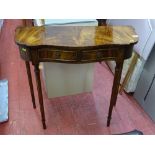 Reproduction crossbanded walnut serpentine front two drawer hall table