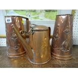 Pair of Arts & Crafts style copper jugs (damage) and another copper jug