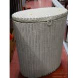 White finished oval wicker laundry basket