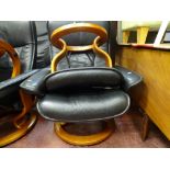 Ekornes stressless swivel and reclining armchair with matching footstool