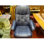 Blue leather effect swivel and recline armchair