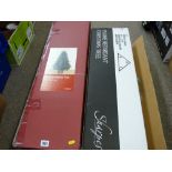 Two boxed artificial Christmas trees