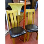 Pair of ultra modern high back oak and leather effect seated side chairs and a red stained